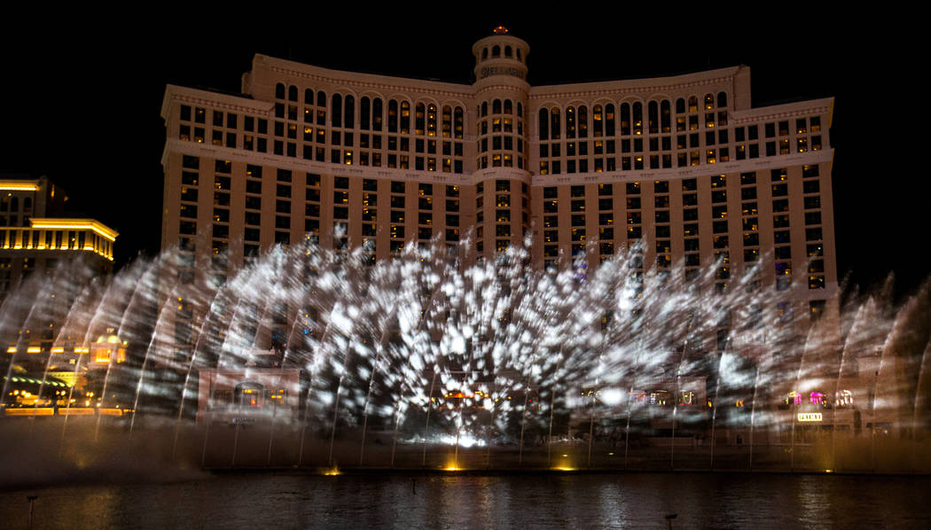 Snow falls during the debut of the new water show based on "Game of Thrones" at the B ...