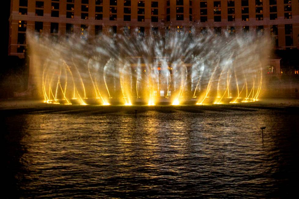 Snow falls during the debut of the new water show based on "Game of Thrones" at the B ...