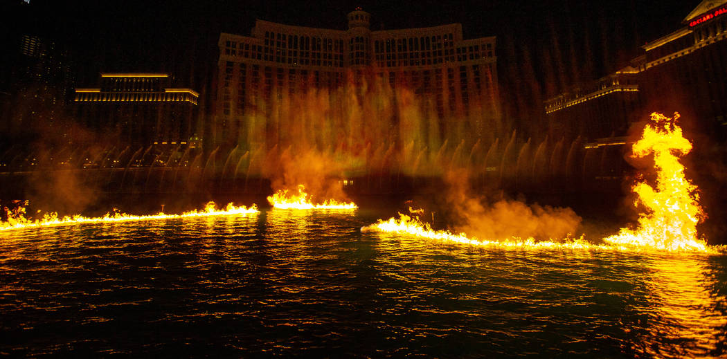 Flames burn on the water during the debut of the new water show based on "Game of Thrones& ...