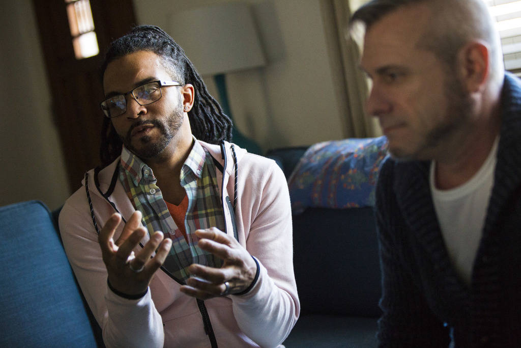 Jeff White, left, talks about his partner, Jim Foley, right, who was diagnosed as HIV positive ...