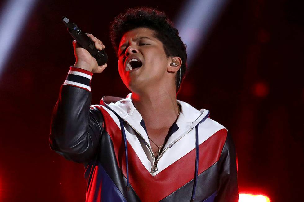 Bruno Mars performs Feb. 12, 2017, at the 59th annual Grammy Awards in Los Angeles. Mars, (Phot ...