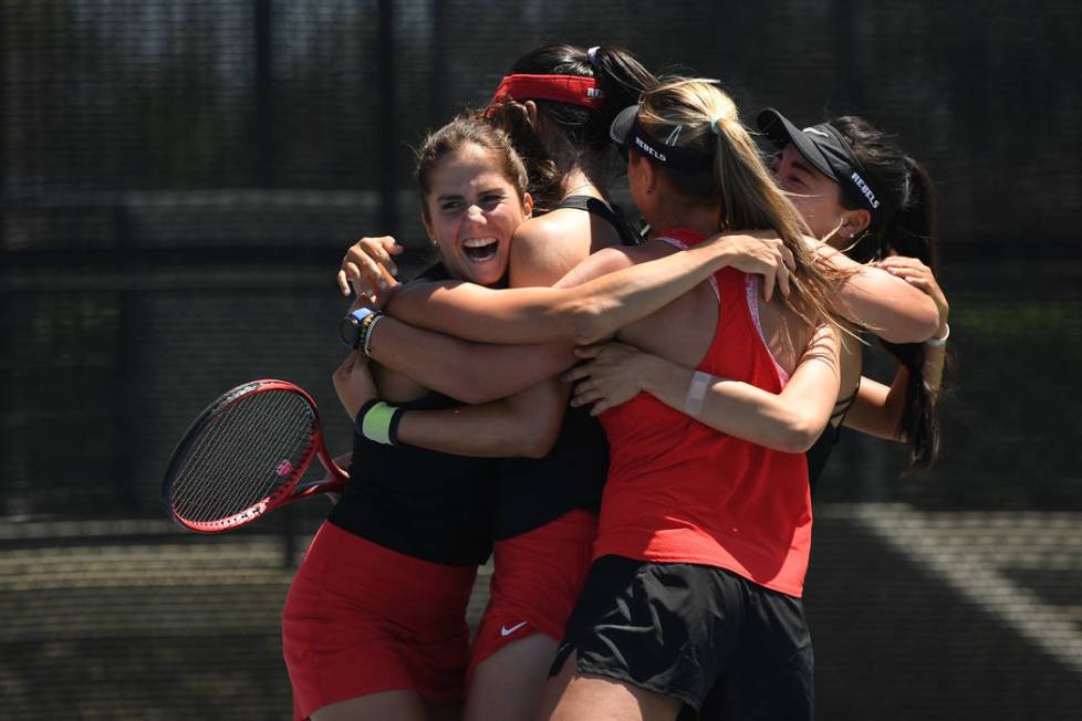 The UNLV women's tennis team celebrates after shutting out host San Diego State in the Mountain ...