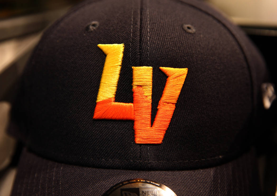 The Las Vegas Aviators logo is on hats for sale within the sales office in Downtown Summerlin a ...
