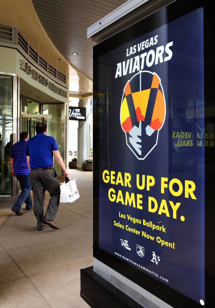 Customers enter the Las Vegas Aviators sales office in Downtown Summerlin which offers info on ...