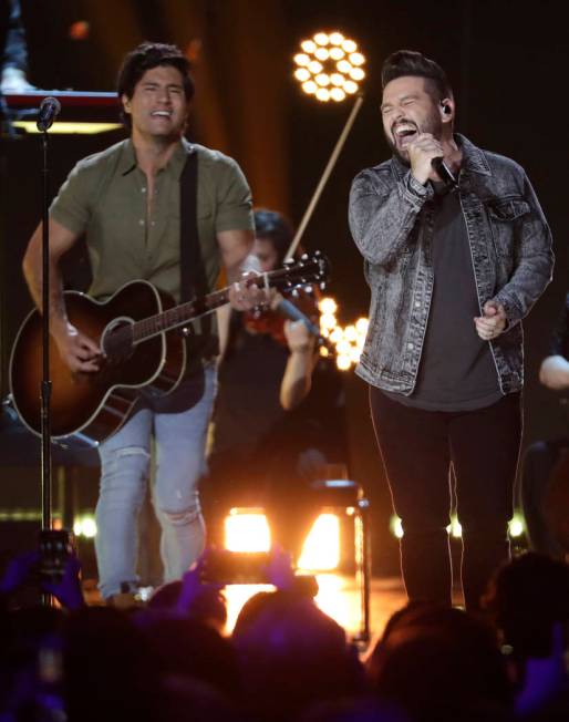 Dan Smyers, left, and Shay Mooney of musical group Dan + Shay, lead the 54th Academy of Country ...