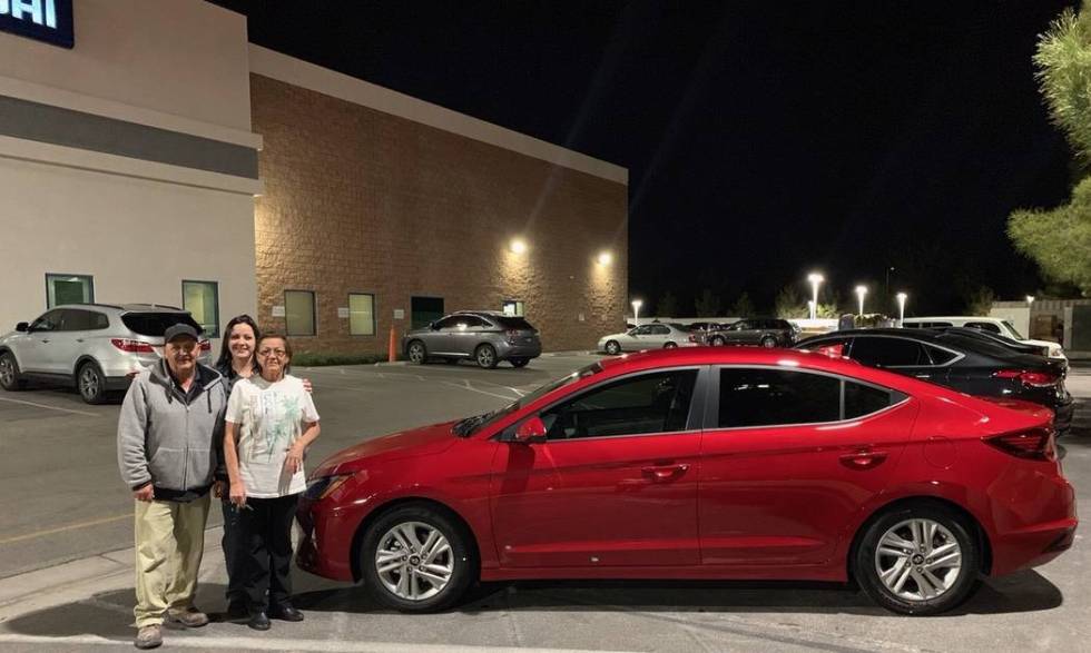 Hyundai of Las Vegas Diana Medina is seen with her parents, Daniel and Dora Medina, in front of ...