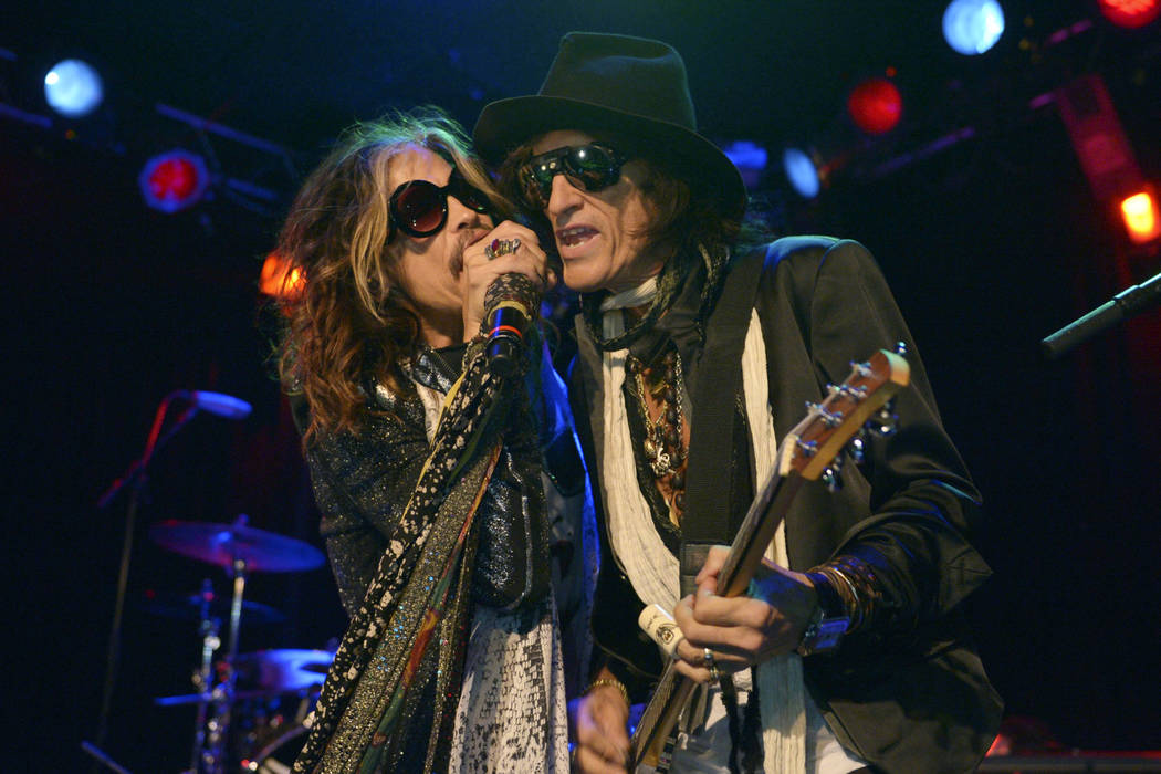 FILE - In this April 8, 2014 file photo, Steven Tyler, left, and Joe Perry of Aerosmith perform ...