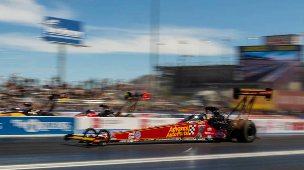 Top Fuel racer Brittany Force blasts down the track during the NHRA Mello Yellow Drag Racing Se ...