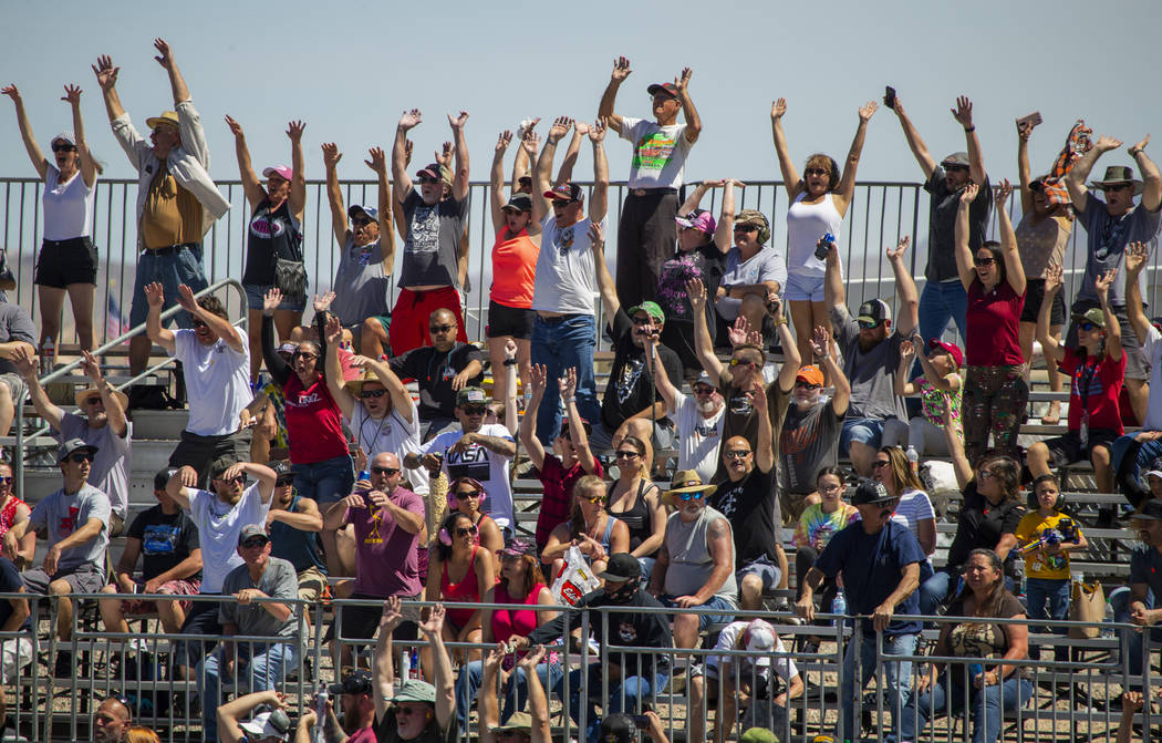 Fans get pumped up during the NHRA Mello Yellow Drag Racing Series on The Strip at the Las Vega ...