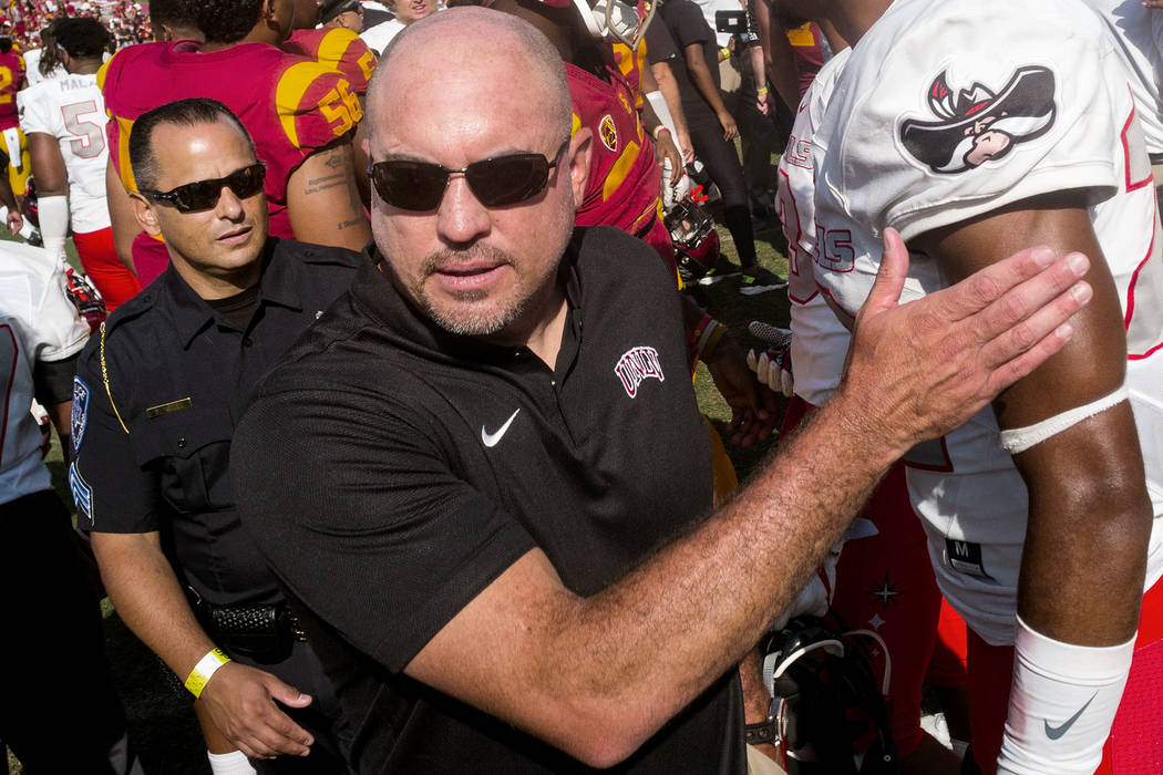 UNLV Rebels head coach Tony Sanchez leaves the field following after losing to the USC Trojans ...