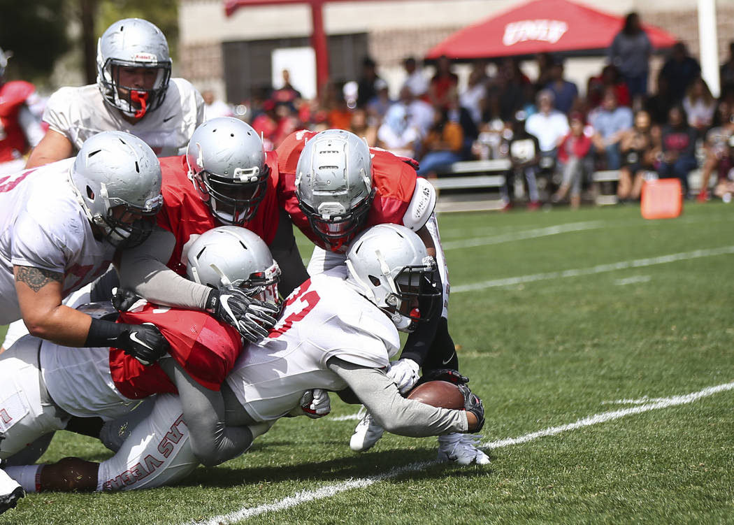 UNLV Rebels defensive back Dalton Baker (33) scores a touchdown during the spring football game ...