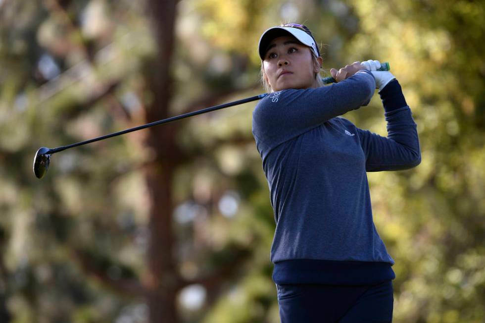 Danielle Kang plays her shot from the 13th tee during the first round of the Kia Classic LPGA g ...