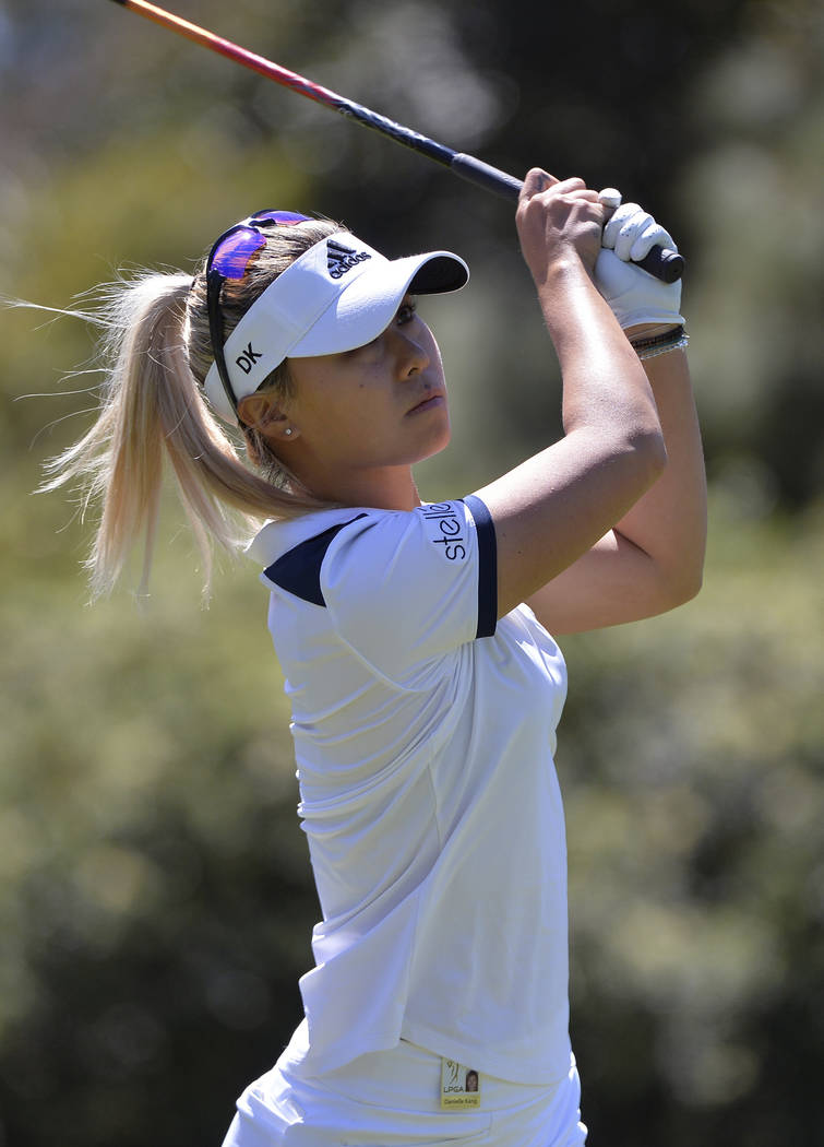 Danielle Kang watches her shot from the second tee during the final round of the Kia Classic LP ...