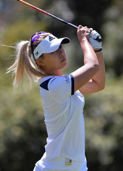 Danielle Kang watches her shot from the second tee during the final round of the Kia Classic LP ...