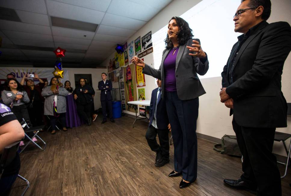 Former assemblywoman Olivia Diaz, a Las Vegas City Council candidate for Ward 3, center right, ...