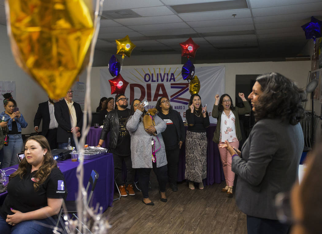 Supporters of former assemblywoman Olivia Diaz, a Las Vegas City Council candidate, reacts as r ...