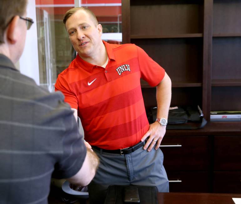 New UNLV basketball coach T.J. Otzelberger talks to a reporter in his office at the Thomas &amp ...