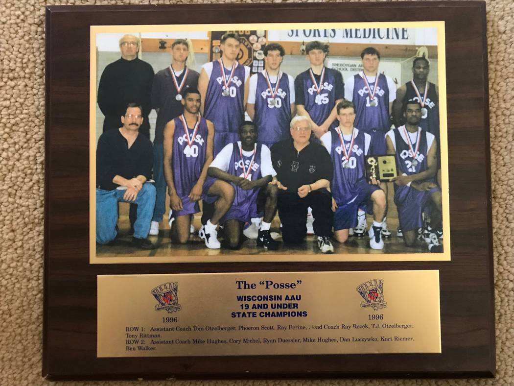 New UNLV coach T.J. Otzelberger poses with the Milwaukee AAU team he created in the 1990s. He i ...