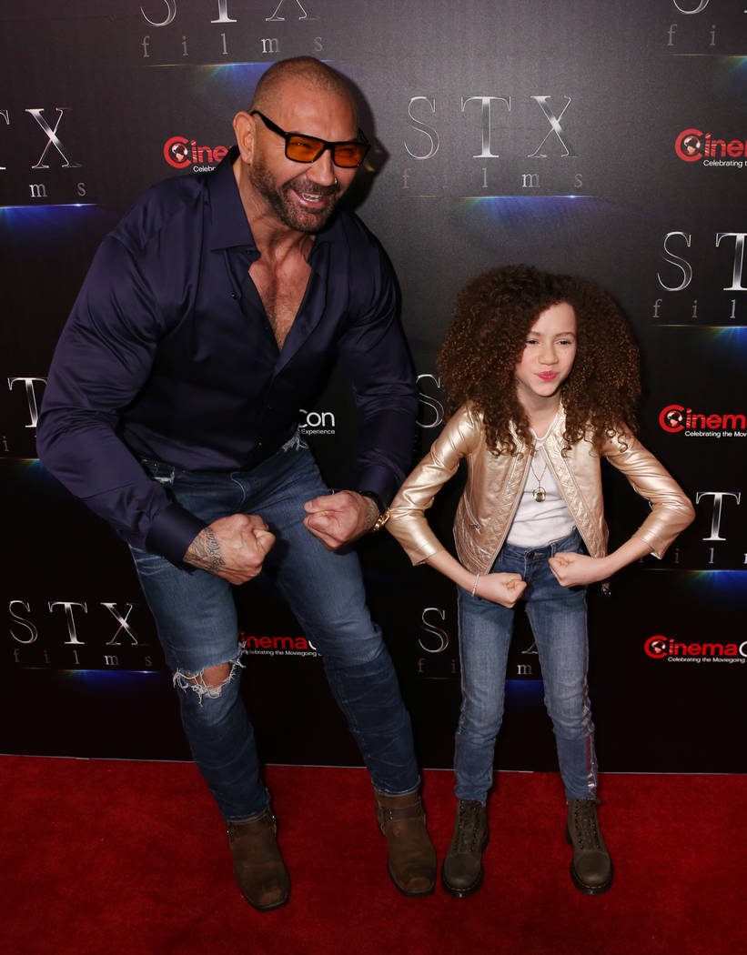 Actors Dave Bautista, left, and Chloe Coleman from MySpy arrive at CinemaCon red carpet at The ...