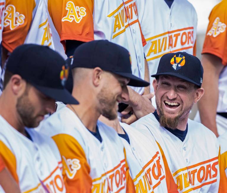 Aviators players joke around during their team photo at media day at Las Vegas Ballpark on Tues ...