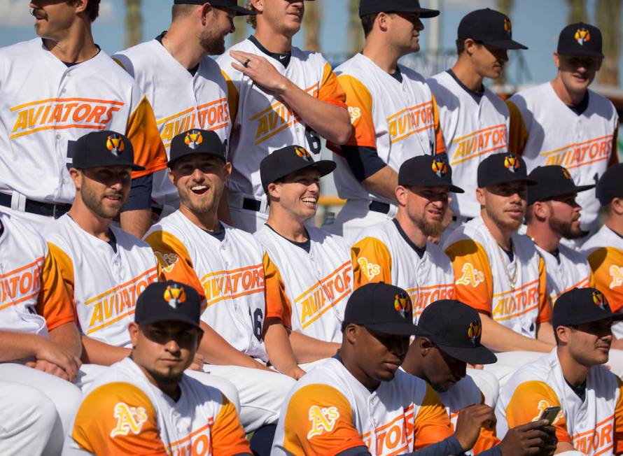 Aviators players joke around during their team photo at media day at Las Vegas Ballpark on Tues ...