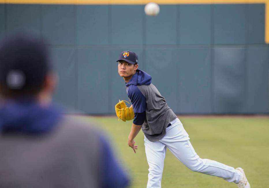 Aviators players warm up before the start of practice during media day at Las Vegas Ballpark on ...