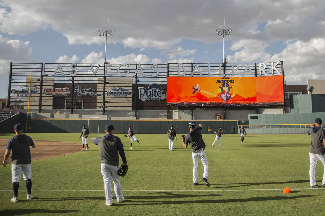 Aviators players warm up before the start of practice during media day at Las Vegas Ballpark on ...