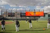 Aviators players warm up before the start of practice during media day at Las Vegas Ballpark on ...
