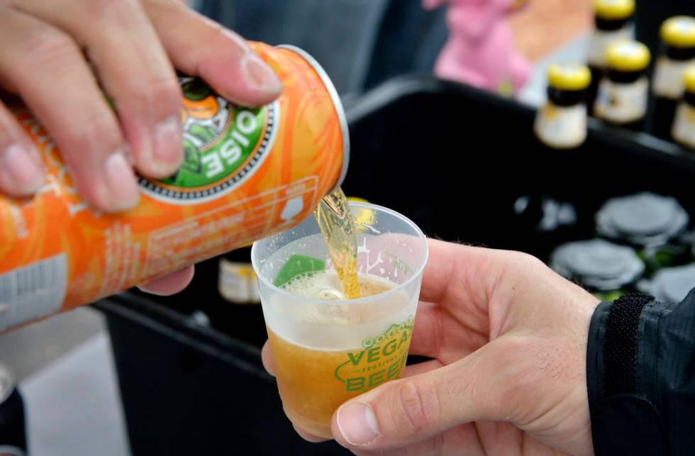 An apricot hefe is poured at the Eurobrews tent during the Great Vegas Festival of Beer in the ...