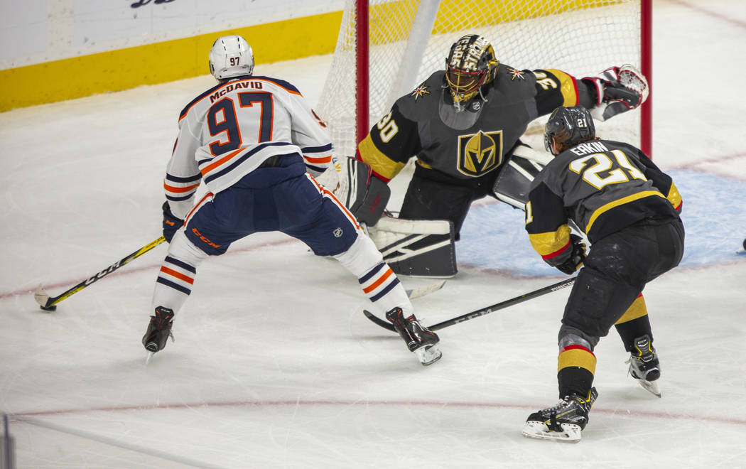 Edmonton Oilers center Connor McDavid (97) eyes the goal as Vegas Golden Knights goaltender Mal ...