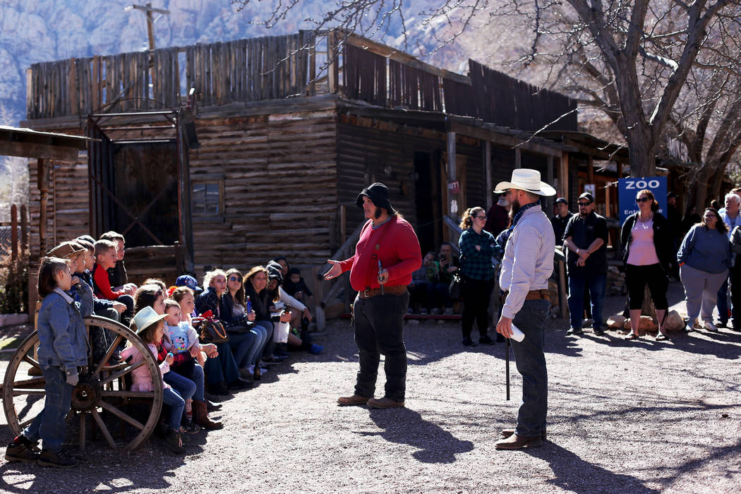 Actors address the crowd before a performance at Bonnie Springs in Blue Diamond, Friday, March ...