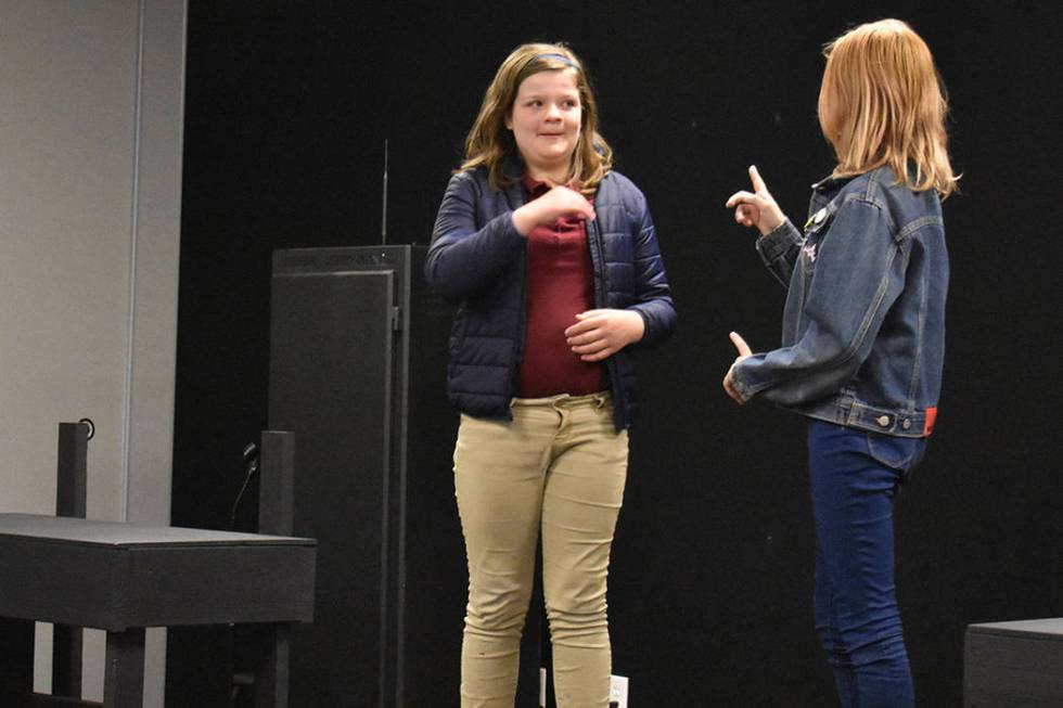 Grace Wilkins, left, and Dean Withem perform their scene, “Remember the Burrito,” to their ...