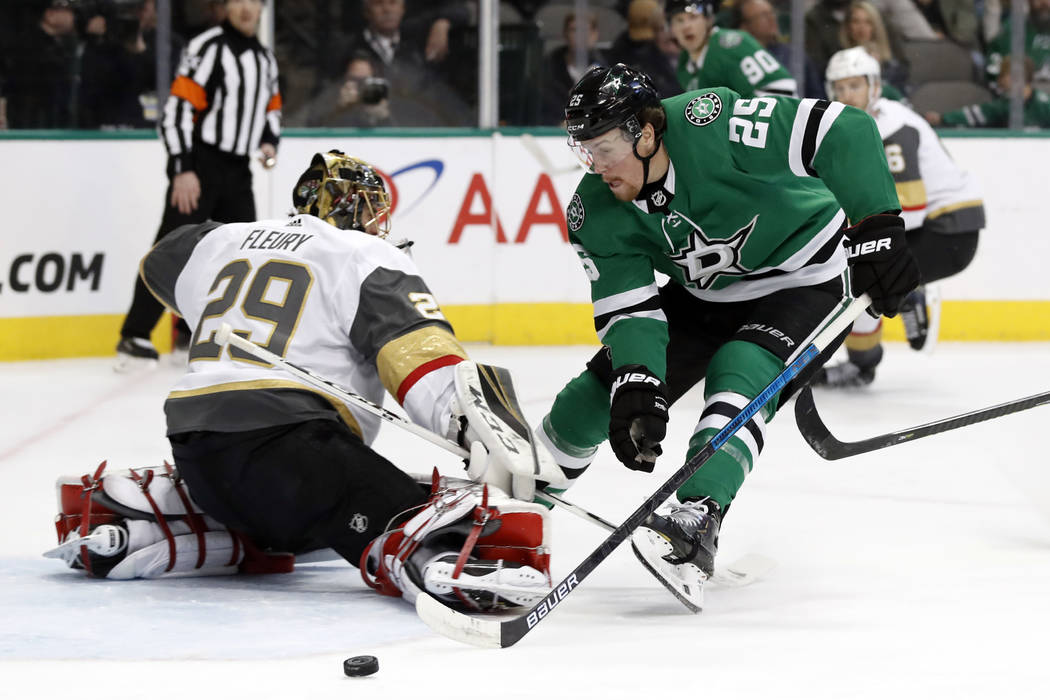 Vegas Golden Knights goaltender Marc-Andre Fleury (29) deflects a shot as Dallas Stars right wi ...