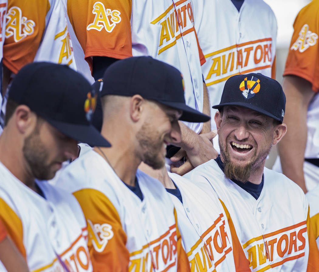 Aviators players joke around during their team photo at media day at Las Vegas Ballpark on Tues ...