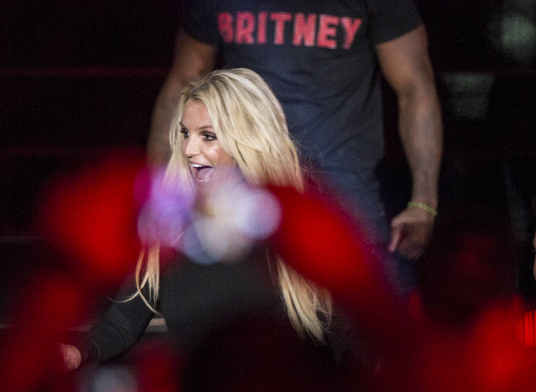 Britney Spears signs autographs during an event to announce her new residency at The Park Theat ...