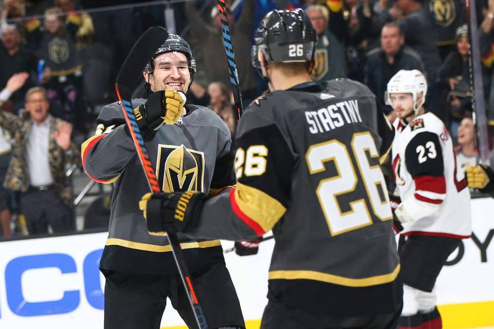 Golden Knights right wing Mark Stone (61) celebrates his goal against the Arizona Coyotes with ...