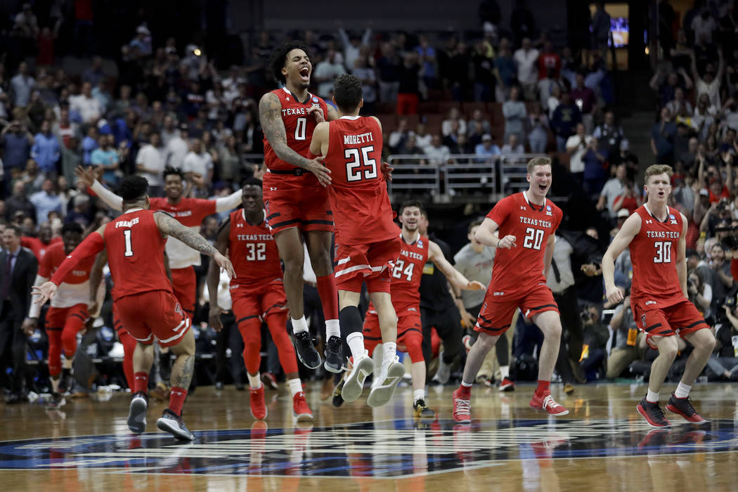 FILE - In this March 30, 2019, file photo, Texas Tech celebrates after a win against Gonzaga in ...