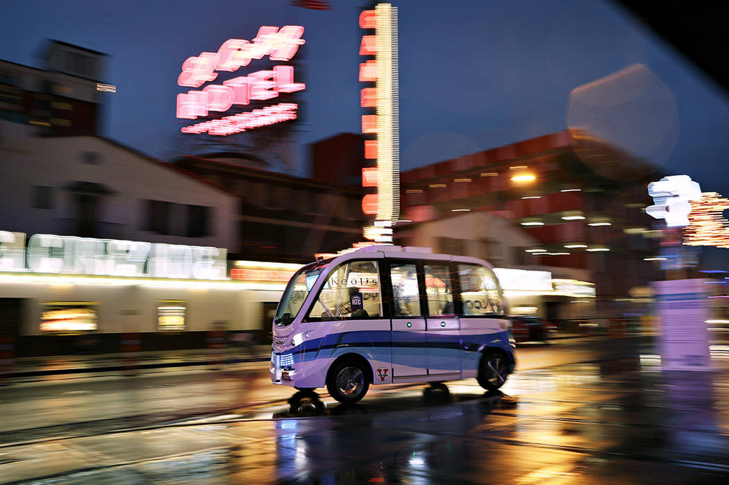 In this Jan. 12, 2017, photo, the Navya Arma autonomous vehicle drives down a street in Las Veg ...