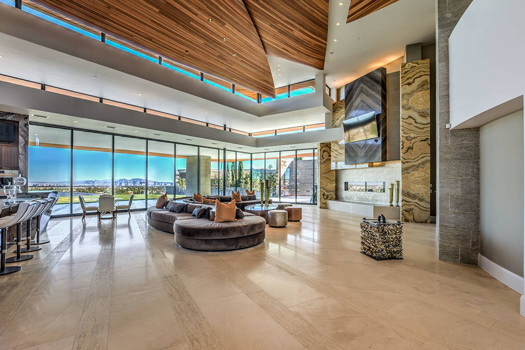 The home has a lot of floor-to-ceiling windows to capture the sweeping views of the Strip. (Ber ...