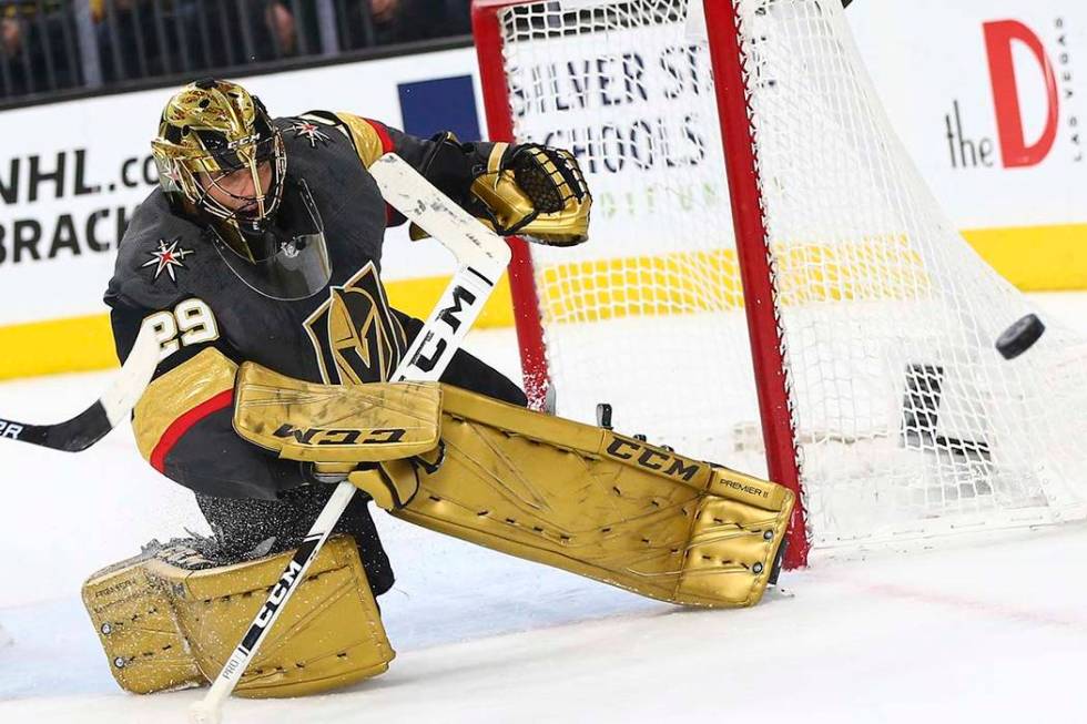 Golden Knights goaltender Marc-Andre Fleury (29) blocks a shot from the Arizona Coyotes during ...