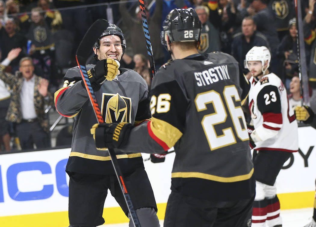 Golden Knights right wing Mark Stone (61) celebrates his goal against the Arizona Coyotes with ...