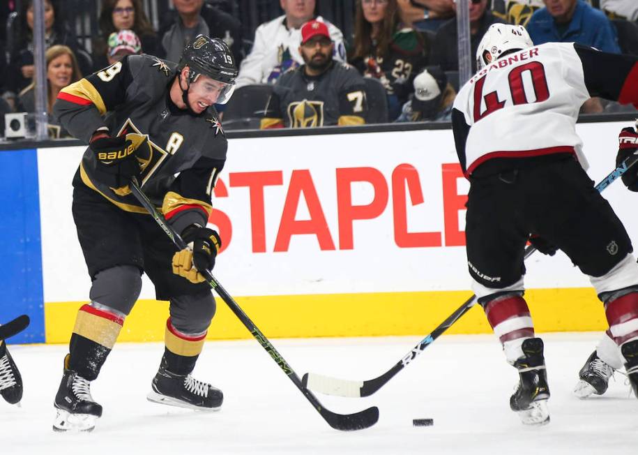 Golden Knights right wing Reilly Smith (19) moves the piuck around Arizona Coyotes right wing M ...