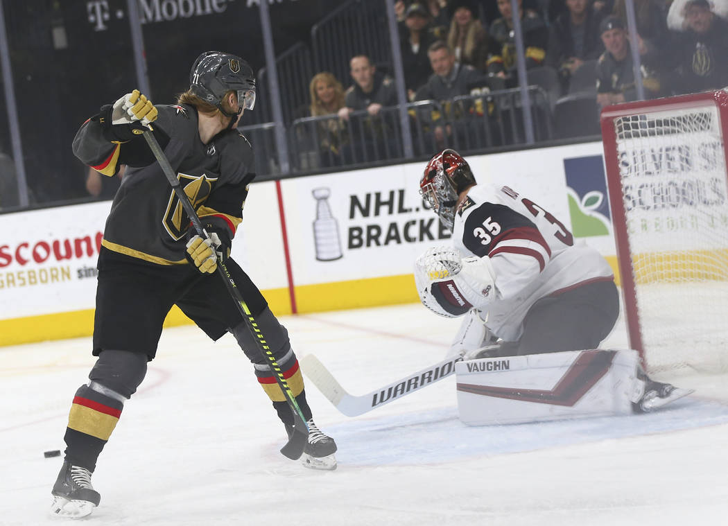 Golden Knights center William Karlsson (71) comes up short on a shot against Arizona Coyotes go ...