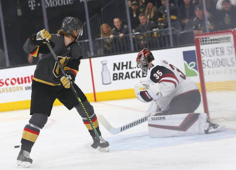 Golden Knights center William Karlsson (71) comes up short on a shot against Arizona Coyotes go ...