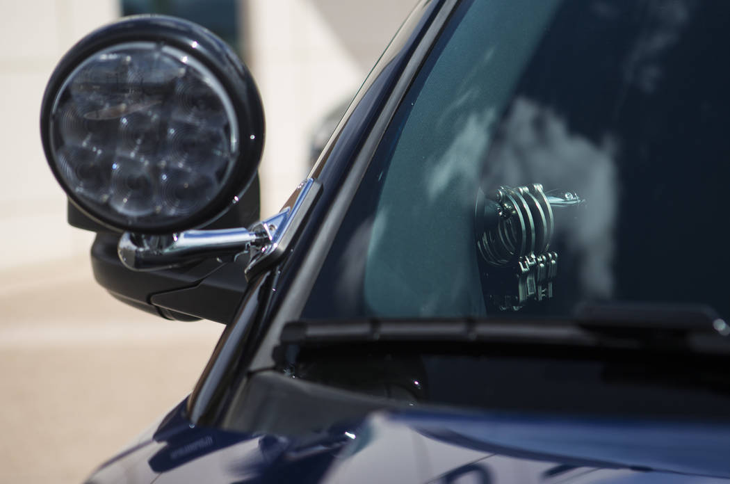 Handcuffs pictured inside a Nevada Highway Patrol sedan outside of Metropolitan Police Departme ...