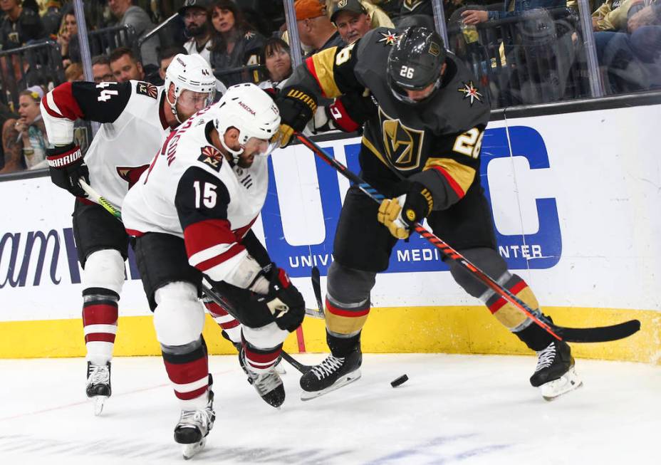 Arizona Coyotes center Brad Richardson (15) and Golden Knights center Paul Stastny (26) battle ...