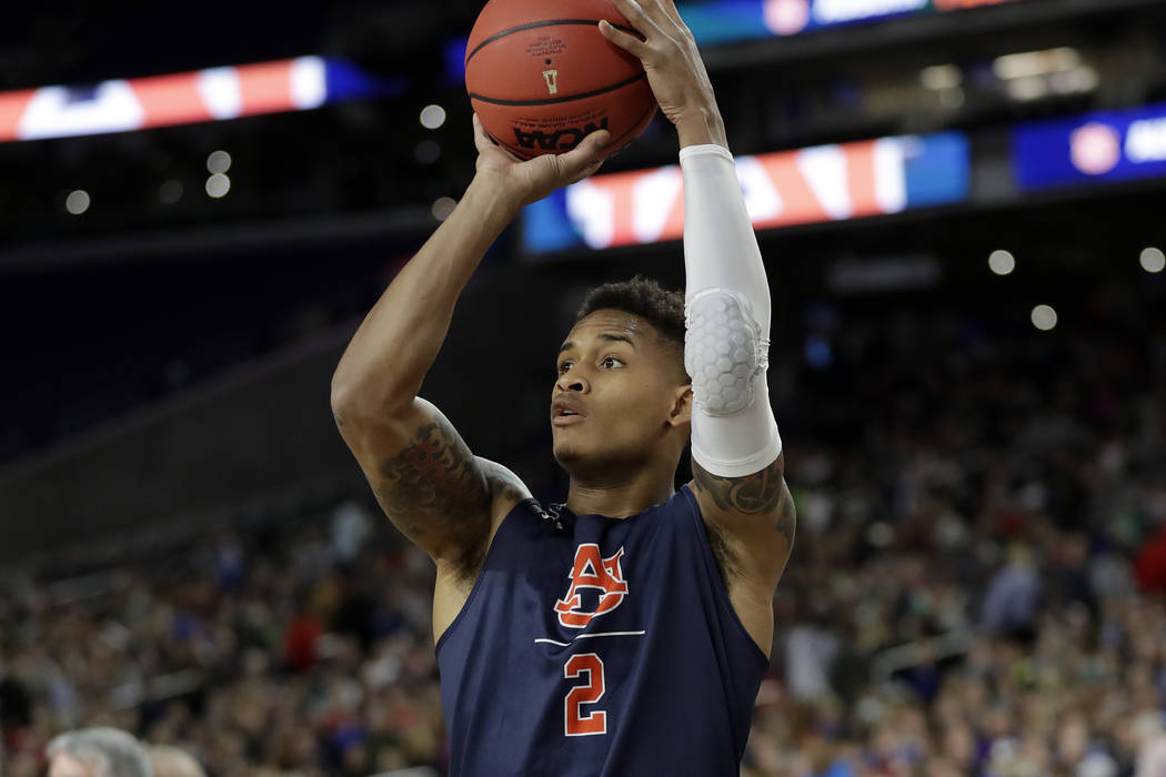 Auburn's Bryce Brown (2) warms up during a practice session for the semifinals of the Final Fou ...