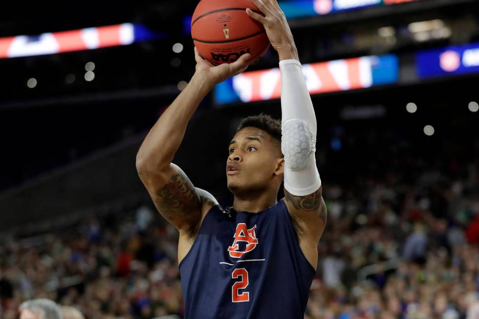 Auburn's Bryce Brown (2) warms up during a practice session for the semifinals of the Final Fou ...