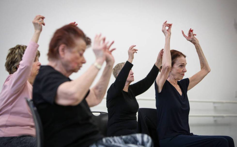 People participate in a ballet class for individuals with Parkinson's disease lead by Pamela La ...