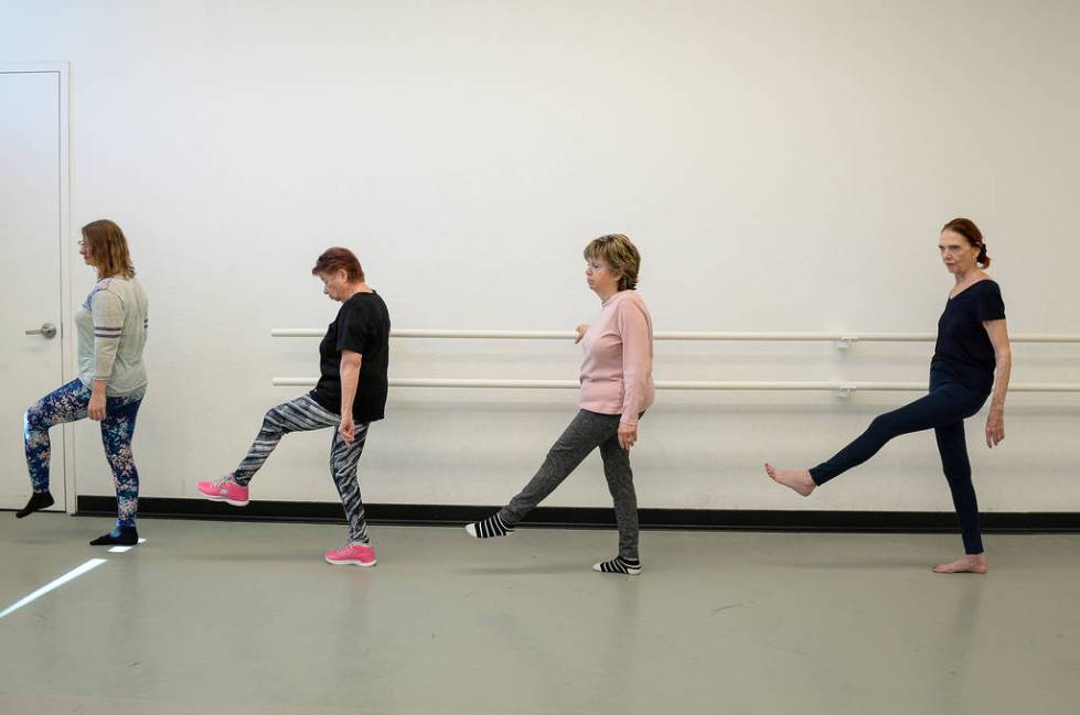 People participate in a ballet class for individuals with Parkinson's disease lead by Pamela La ...